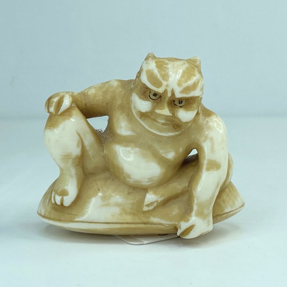 Signed c1920 Hand carved Resin Japanese Netsuke Thunder gold (raiden) A589